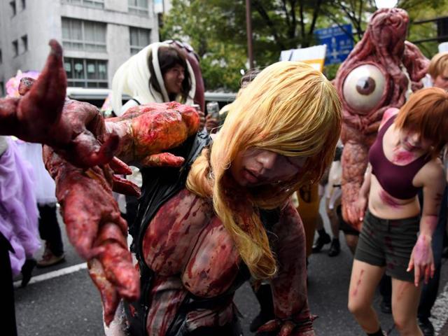And if they stepped out, they would wear masks so that they would be mistaken as fellow ghosts. Participants at the Kawasaki Halloween parade. (AFP) And if they stepped out, they would wear masks so that they would be mistaken as fellow ghosts. Participants at the Kawasaki Halloween parade. (AFP)