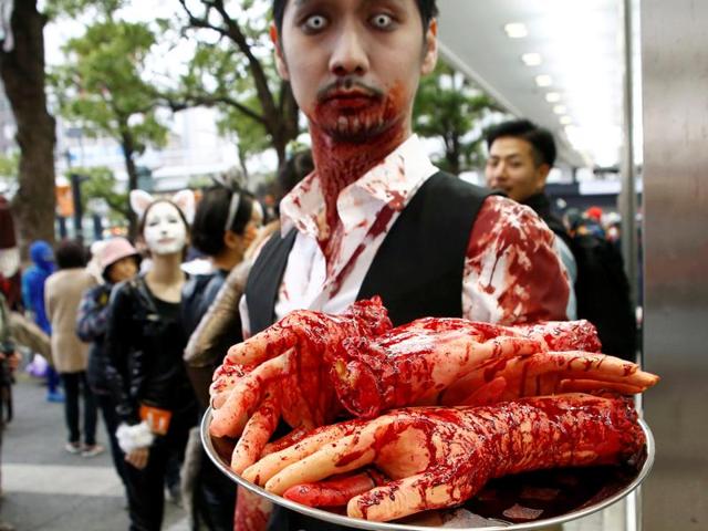 Hence, the night before became All Hallows Eve. It was later shortened to Halloween. A participant poses during the Halloween parade in Kawasaki. (REUTERS) Hence, the night before became All Hallows Eve. It was later shortened to Halloween. A participant poses during the Halloween parade in Kawasaki. (REUTERS)