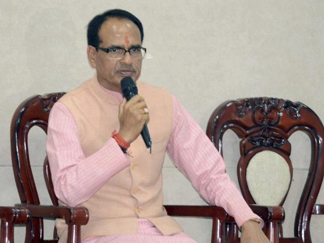 Madhya Pradesh chief minister Shivraj Singh Chouhan addresses a press conference at his residence in Bhopal on Monday.(PTI)
