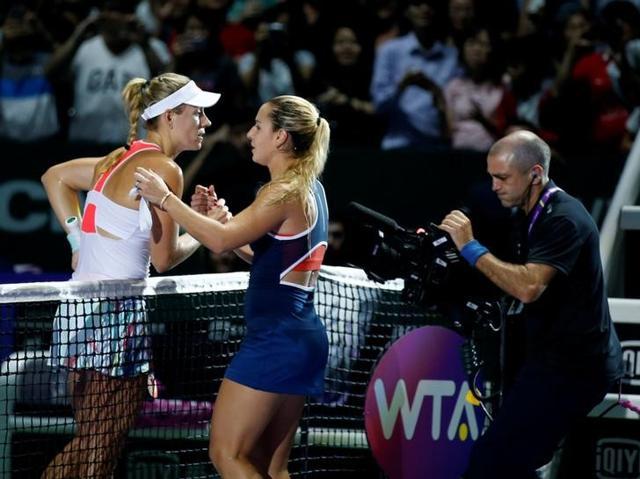 Cibulkova and Kerber embrace at the net after the match. (Reuters) Cibulkova and Kerber embrace at the net after the match. (Reuters)