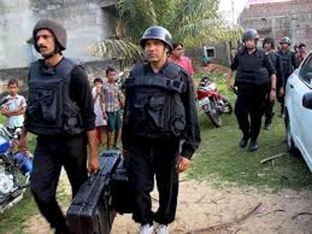 Policemen lock the house where an IED exploded accidentally on October 2, 2014 revealing the biggest terror network operating in Bengal so far.(HT Photo)