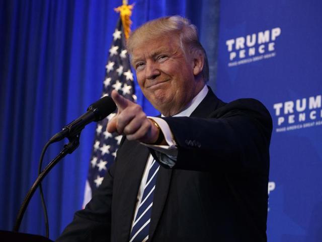 Republican presidential candidate Donald Trump addresses supporters at Macomb Community College in Warren, Michigan, on October 31. (AFP) Republican presidential candidate Donald Trump addresses supporters at Macomb Community College in Warren, Michigan, on October 31. (AFP)