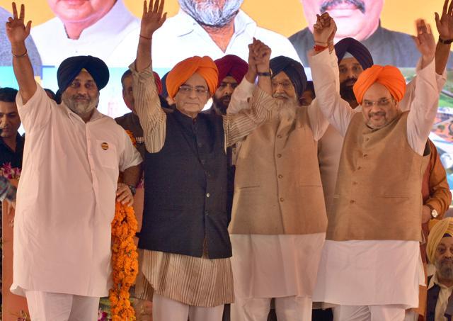From left: Deputy CM Sukhbir Singh Badal, Union finance minister Arun Jaitley, CM Parkash Singh Badal and BJP president Amit Shah at a rally to mark 50 years of Punjabi suba, in Amritsar on Tuesday. (Gurpreet Singh/HT Photo) From left: Deputy CM Sukhbir Singh Badal, Union finance minister Arun Jaitley, CM Parkash Singh Badal and BJP president Amit Shah at a rally to mark 50 years of Punjabi suba, in Amritsar on Tuesday. (Gurpreet Singh/HT Photo)