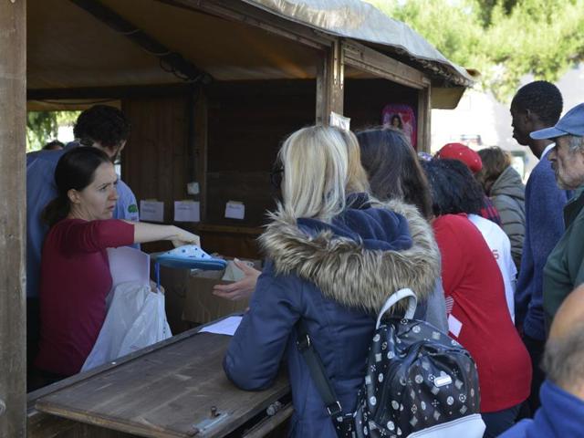 Italian civil protection personnel hand out items of clothing to people moved from the quake area at an assistance center set up in a hotel in Porto Sant'Elpidio Italy on October 31. (AP File) Italian civil protection personnel hand out items of clothing to people moved from the quake area at an assistance center set up in a hotel in Porto Sant'Elpidio Italy on October 31. (AP File)
