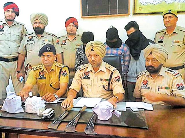 The three accused in police custody. (HT Photo) The three accused in police custody. (HT Photo)