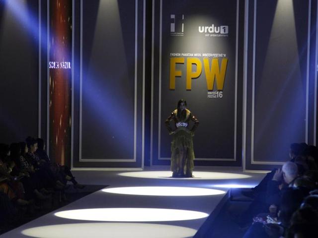 A model ready to present creation of a designer Sobia Nazir during the opening day of Fashion Pakistan Week Winter Festive 16 in Karachi. (AP) A model ready to present creation of a designer Sobia Nazir during the opening day of Fashion Pakistan Week Winter Festive 16 in Karachi. (AP)