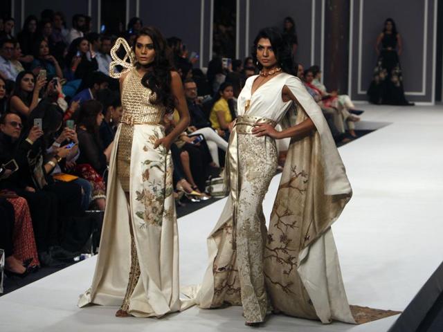 Models present creations by designer Shahla. (AP) Models present creations by designer Shahla. (AP)
