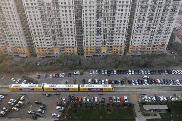 Bird Eye View of Belvedere Park in Cyber City for the representational picture of Residential while a metro was passing in Gurgaon, India, on Thursday, January 21, 2016. (abhinav saha / ht photo )