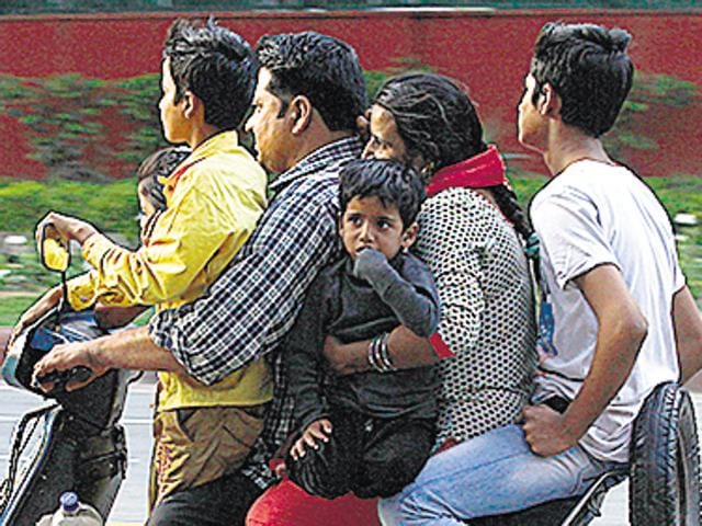 Though the Motor Vehicles Act (1988) makes it mandatory for bikers to wear helmets certified by the Bureau of Indian Standards, most riders in the Capital do not comply with the rule. (Satish Bate/HT PHOTO) Though the Motor Vehicles Act (1988) makes it mandatory for bikers to wear helmets certified by the Bureau of Indian Standards, most riders in the Capital do not comply with the rule. (Satish Bate/HT PHOTO)