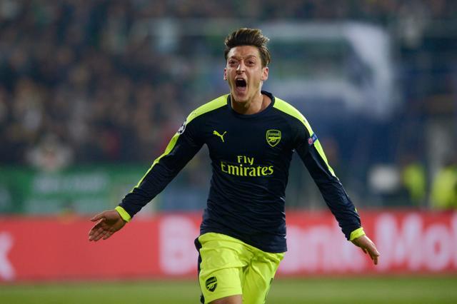 Ozil celebrates scoring the winner for Arsenal. (AFP)