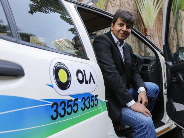 Ola CEO and founder Bhavish Aggarwal (right) takes a selfie with Anand Mahindra, CMD, Mahindra Group at a news conference in Mumbai on September 8, 2016. (REUTERS/file) Ola CEO and founder Bhavish Aggarwal (right) takes a selfie with Anand Mahindra, CMD, Mahindra Group at a news conference in Mumbai on September 8, 2016. (REUTERS/file)