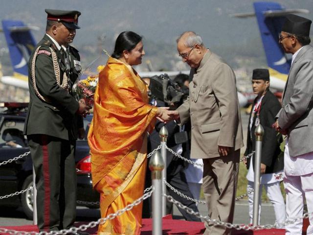 President Pranab Mukherjee with his Nepalese counterpart Bidhya Devi Bhandari during his ceremonial reception in Kathmandu on Wednesday. (PTI) President Pranab Mukherjee with his Nepalese counterpart Bidhya Devi Bhandari during his ceremonial reception in Kathmandu on Wednesday. (PTI)