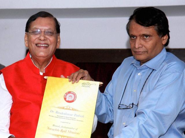 Bindeshwar Pathak, Founder Sulabh, being appointed as Brand Ambassador of Swachh Rail Mission by Railway Minister Suresh Prabhu.(PTI Photo)
