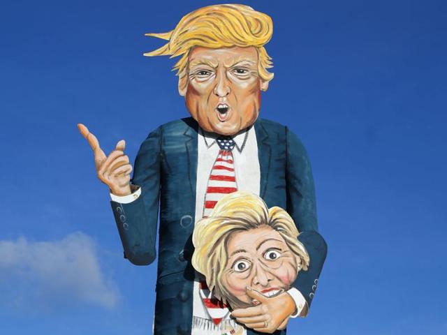 Masks depict Republican presidential candidate Donald Trump and socks depict his Democratic rival Hillary Clinton at a candy shop in Pasadena, California, on October 30, 2016. America will vote for its new POTUS on November 8, 2016. (Reuters) Masks depict Republican presidential candidate Donald Trump and socks depict his Democratic rival Hillary Clinton at a candy shop in Pasadena, California, on October 30, 2016. America will vote for its new POTUS on November 8, 2016. (Reuters)
