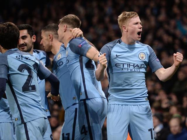 Kevin De Bruyne (R) celebrates scoring the second goal for Manchester City. (AFP) 