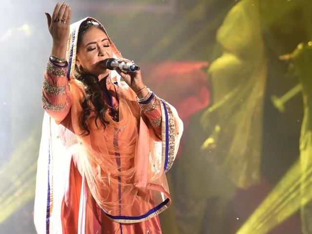 Jaspinder Narula sings during the golden jubilee celebrations of the Punjabi suba (province), as was formed on linguistic basis in 1966, in Amritsar on Tuesday evening. (Gurpreet Singh/HT Photo)