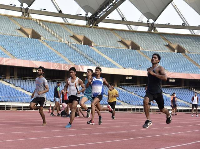 Even when Indian Super League (ISL) matches are held at JNS, the home ground of the Delhi Dynamos franchise, the main track is out of bounds for athletes.(Saumya Khandelwal/HT PHOTO)