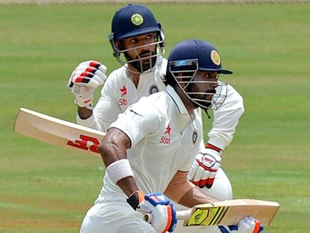 Dhawan, left, is nursing a finger injury, while Rahul suffered a hamstring strain in the first Test against New Zealand.(AFP Photo)