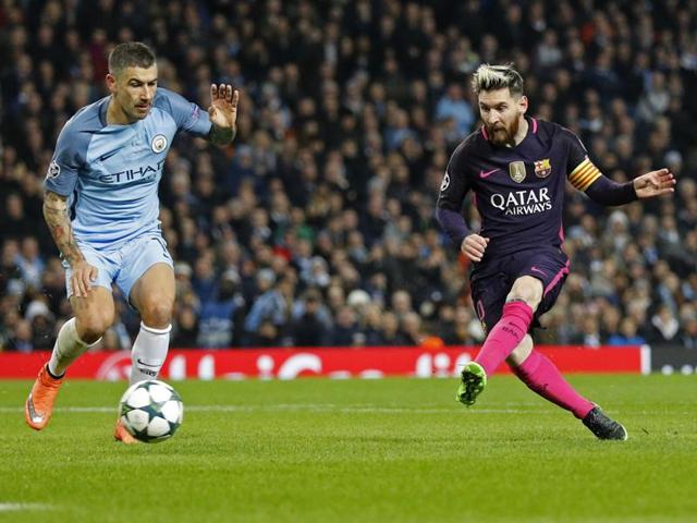 Lionel Messi scores Barcelona’s first goal. (REUTERS) 