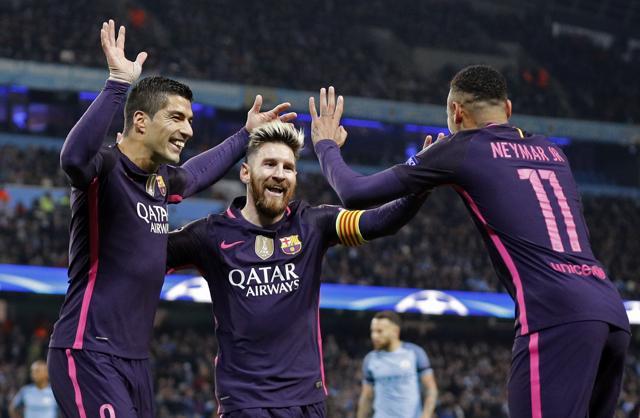 Messi celebrates after giving Barcelona the lead. (REUTERS)