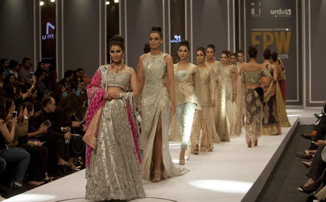 Models present creations from designer Rozina Munib during the "Fashion Pakistan Week Winter Festive 16", in Karachi, Pakistan, Tuesday, Nov. 1, 2016. More than twenty designers are participating in the three-day event organized by Fashion Pakistan Council to showcase latest collections of luxury and bridal wear. (AP Photo/Shakil Adil) (AP) Models present creations from designer Rozina Munib during the "Fashion Pakistan Week Winter Festive 16", in Karachi, Pakistan, Tuesday, Nov. 1, 2016. More than twenty designers are participating in the three-day event organized by Fashion Pakistan Council to showcase latest collections of luxury and bridal wear. (AP Photo/Shakil Adil) (AP)