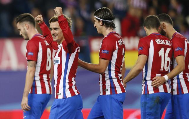 Griezmann celebrates after scoring the winner for Atletico. (AP)