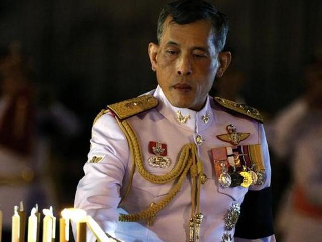 Thailand's Queen Sirikit walks with her son Crown Prince Vajiralongkorn in Bangkok in December 2009. King Bhumibol, the world's longest-reigning monarch, died at age 88 on October 13, 2016. (AP)