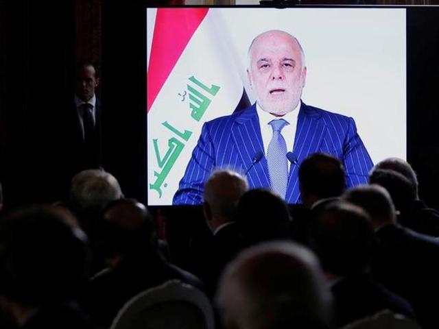File photo Iraqi Prime Minister Haider al-Abadi, seen on a screen as he speaks via a videoconference during a ministerial summit to hold discussion on the future of Mosul city, post-Islamic State, in Paris, France. Abadi has warned Turkey against provoking confrontation after Ankara deployed tanks near the border on November 1, 2016. (AP) File photo Iraqi Prime Minister Haider al-Abadi, seen on a screen as he speaks via a videoconference during a ministerial summit to hold discussion on the future of Mosul city, post-Islamic State, in Paris, France. Abadi has warned Turkey against provoking confrontation after Ankara deployed tanks near the border on November 1, 2016. (AP)