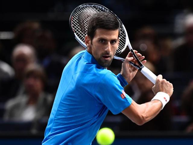 Serbia's Novak Djokovic returns the ball to Gilles Muller.(AFP Photo)