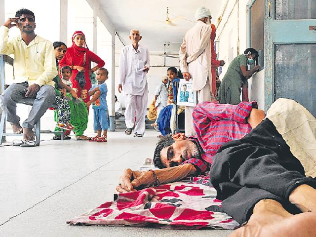 POOR STATE OF AFFAIRS: A patient lies on the floor outside the OPD at TB Hospital in Patiala.(Bharat Bhushan and Sanjeev Kumar/HT)