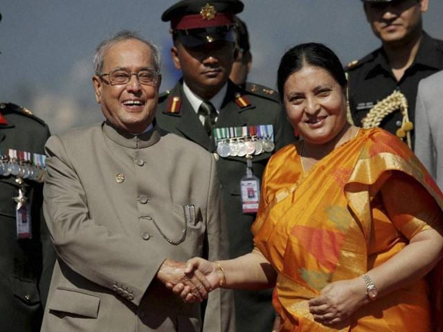 President Pranab Mukherjee with his Nepalese counterpart Bidhya Devi Bhandari waves to the media upon his arrival at the Tribhuwan international Airport in Kathmandu, Nepal on November 2, 2016. (AP) President Pranab Mukherjee with his Nepalese counterpart Bidhya Devi Bhandari waves to the media upon his arrival at the Tribhuwan international Airport in Kathmandu, Nepal on November 2, 2016. (AP)