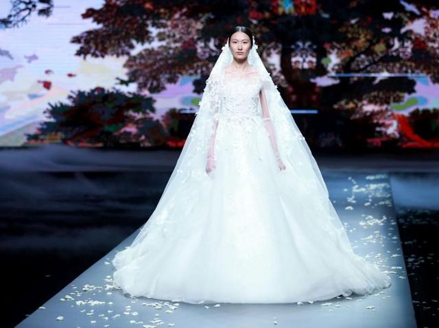 Gown dreams became reality on the China Fashion Week ramp. See models instantly transform into the princesses /queens they’ve always wanted to be. (AFP) Gown dreams became reality on the China Fashion Week ramp. See models instantly transform into the princesses /queens they’ve always wanted to be. (AFP)