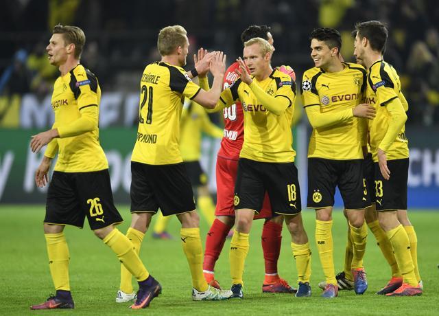 Dortmund players celebrate their win. (AP) Dortmund players celebrate their win. (AP)