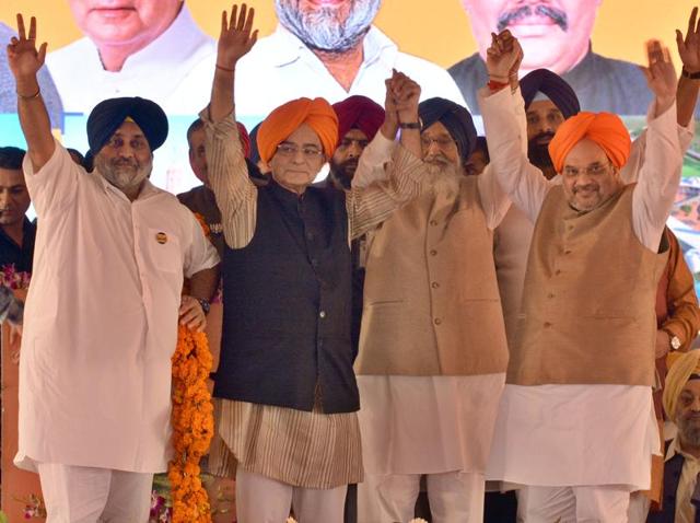 Deputy CM Punjab Sukhbir Badal, Union finance minister Arun Jaitley, Punjab CM Parkash Singh Badal and BJP national president Amit Shah during the 50th year of Punjabi Suba celebration rally, Amritsar on November 1. (HT Photo/ Gurpreet Singh) Deputy CM Punjab Sukhbir Badal, Union finance minister Arun Jaitley, Punjab CM Parkash Singh Badal and BJP national president Amit Shah during the 50th year of Punjabi Suba celebration rally, Amritsar on November 1. (HT Photo/ Gurpreet Singh)