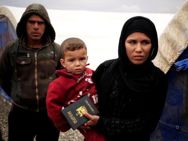 People who just fled Mosul are seen at Al Khazer camp near Hassan Sham, east of Mosul, Iraq on November 2. (Reuters) People who just fled Mosul are seen at Al Khazer camp near Hassan Sham, east of Mosul, Iraq on November 2. (Reuters)