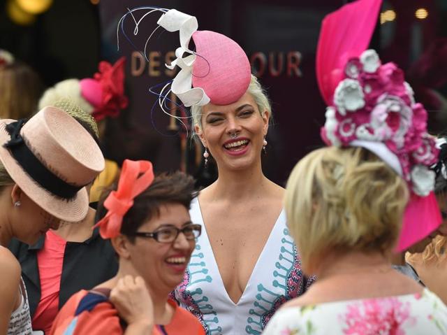 'Fashion on the Field' competitors share a laugh at Flemington Racecourse. Don’t miss her nose ring... (AFP) 'Fashion on the Field' competitors share a laugh at Flemington Racecourse. Don’t miss her nose ring... (AFP)