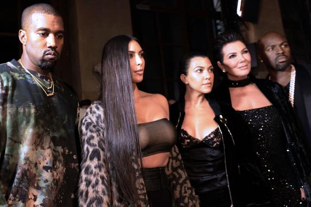 Kanye West, Kim Kardashian, Kourtney Kardashian, Kris Jenner and Corey Gamble attend the Off-white 2017 Spring/Summer ready-to-wear collection fashion show, on September 29, 2016 in Paris. (AFP) Kanye West, Kim Kardashian, Kourtney Kardashian, Kris Jenner and Corey Gamble attend the Off-white 2017 Spring/Summer ready-to-wear collection fashion show, on September 29, 2016 in Paris. (AFP)