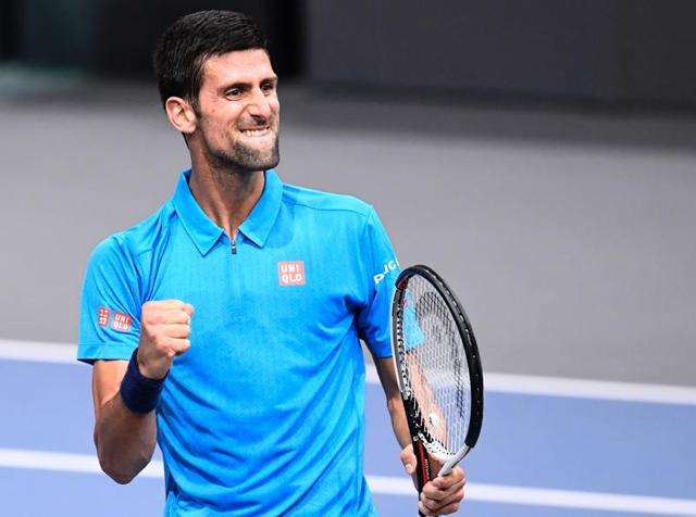 Djokovic returns serve against Gilles Muller. (AP) Djokovic returns serve against Gilles Muller. (AP)