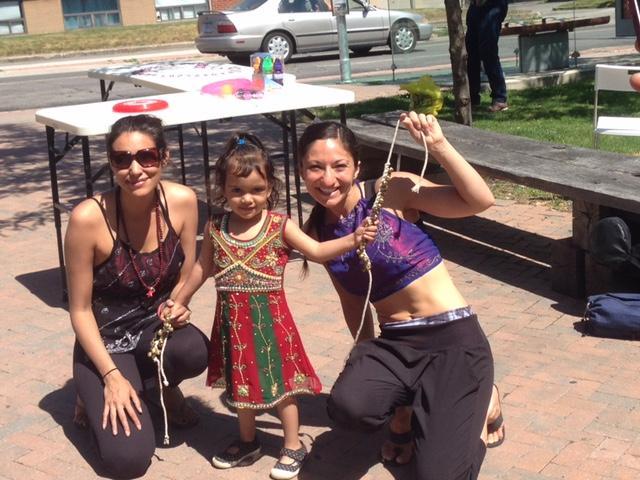 Ashima Suri (left) at a Bolly Yoga demo in Toronto. (Courtesy Ashima Suri)