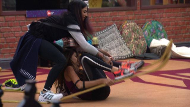 Bani tries to pull Lopa down during the task. (Colors) Bani tries to pull Lopa down during the task. (Colors)