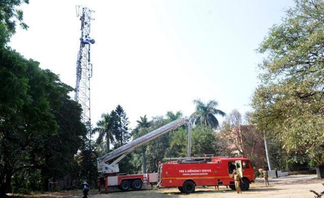 The tower from a distance, also seen are emergency teams. (Anil Dayal/HT Photo) The tower from a distance, also seen are emergency teams. (Anil Dayal/HT Photo)
