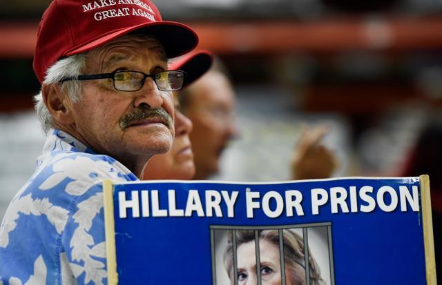 A man displays support for Republican presidential nominee Donald Trump at a get-out-the-vote rally in Las Vegas. (AFP) A man displays support for Republican presidential nominee Donald Trump at a get-out-the-vote rally in Las Vegas. (AFP)