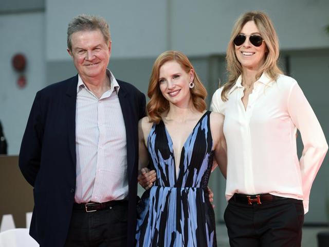 Actress Jessica Chastain, center, poses with directors John Madden, left, and Kathryn Bigelow during the hand and footprint ceremony. (AP) Actress Jessica Chastain, center, poses with directors John Madden, left, and Kathryn Bigelow during the hand and footprint ceremony. (AP)