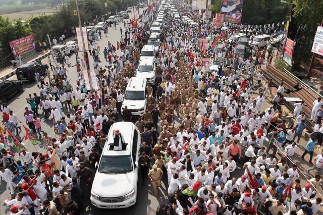 Uttar Pradesh chief minister, Akhilesh Yadav, waves at the crowd after he switched to his SUV. (Nand Kumar / PTI) Uttar Pradesh chief minister, Akhilesh Yadav, waves at the crowd after he switched to his SUV. (Nand Kumar / PTI)