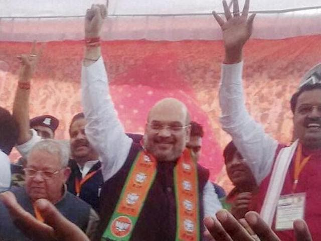 BJP president Amit Shah with his supporters during an election rally for UP elections in Saharanpur on Saturday.(PTI Photo)