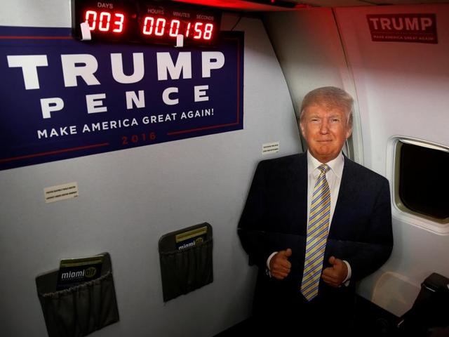 A cardboard cutout of Republican presidential nominee Donald Trump is pictured on a the media charter plane with a countdown clock to the election while sitting on the tarmac at the airport in Tampa, Florida. (REUTERS) A cardboard cutout of Republican presidential nominee Donald Trump is pictured on a the media charter plane with a countdown clock to the election while sitting on the tarmac at the airport in Tampa, Florida. (REUTERS)