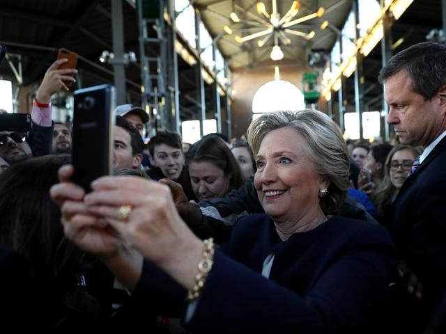 Democratic presidential nominee former Secretary of State Hillary Clinton takes a selfie with supporters during a campaign rally at Eastern Market on November 4, 2016 in Detroit, Michigan. With less than a week to go until election day, Hillary Clinton is campaigning in Pennsylvania, Ohio and Michigan. (AFP) Democratic presidential nominee former Secretary of State Hillary Clinton takes a selfie with supporters during a campaign rally at Eastern Market on November 4, 2016 in Detroit, Michigan. With less than a week to go until election day, Hillary Clinton is campaigning in Pennsylvania, Ohio and Michigan. (AFP)