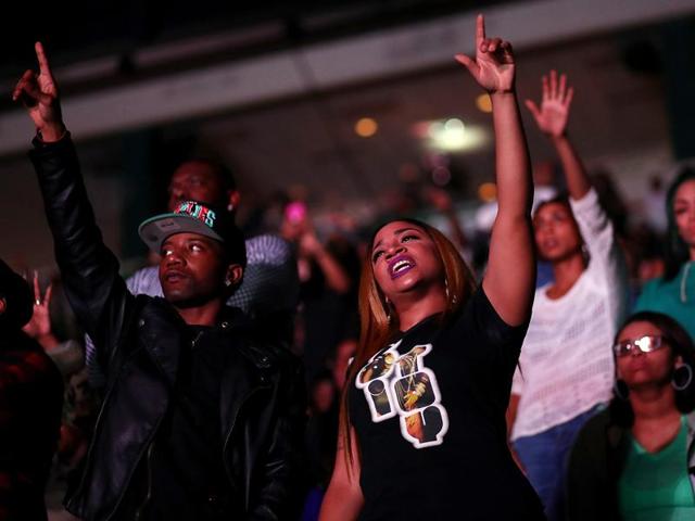 Attendees dance as Jay Z performs during a Get Out The Vote concert Democratic presidential nominee former Secretary of State Hillary Clinton at Wolstein Center. (AFP) Attendees dance as Jay Z performs during a Get Out The Vote concert Democratic presidential nominee former Secretary of State Hillary Clinton at Wolstein Center. (AFP)