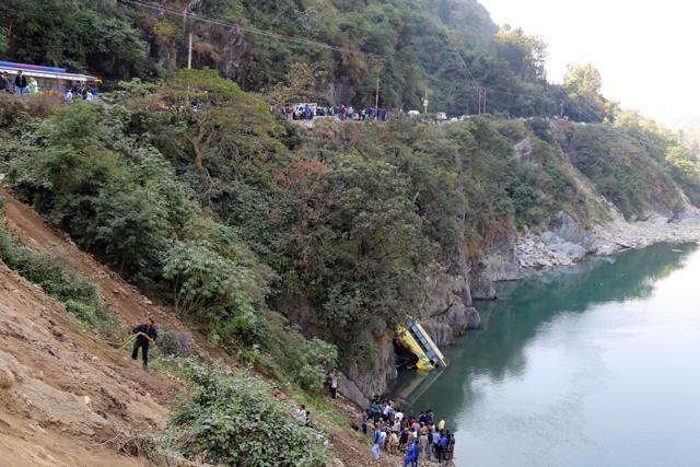 The bus after it fell into the Beas near Mandi on Saturday. (Birbal Sharma/HT Photo)