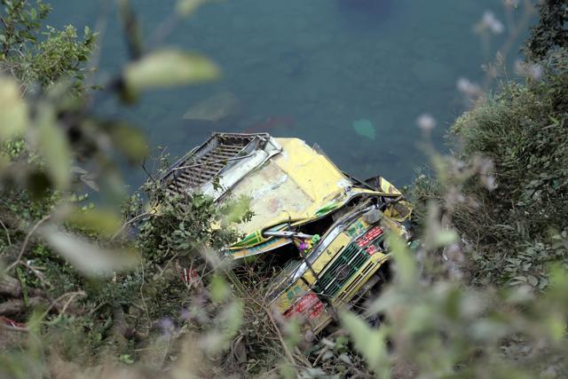 The bus after it fell into the Beas near Mandi on Saturday. (Birbal Sharma/HT Photo)